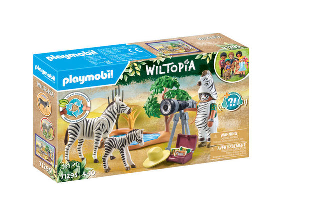 Wiltopia Photographer with Zebras