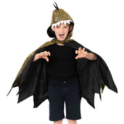 Child wearing a dragon costume with a black cape and gold accents on a white background